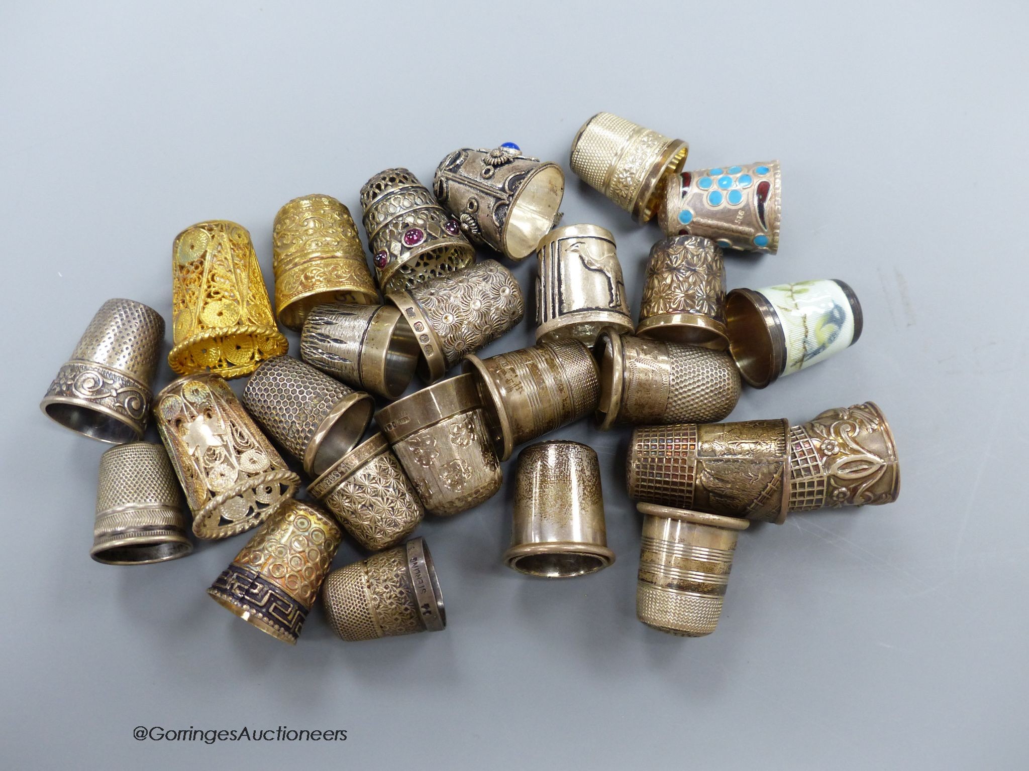 A collection of silver thimbles including a silver Charles Horner thimble